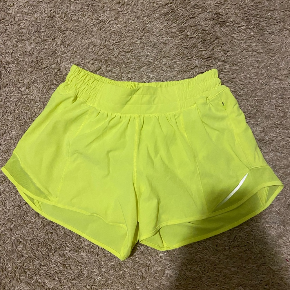 highlight yellow lulu shorts, low rise, 4 inch, size 6